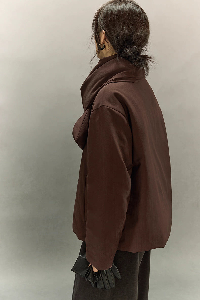 Side and back view highlighting scarf collar and clean lines of puffer jacket