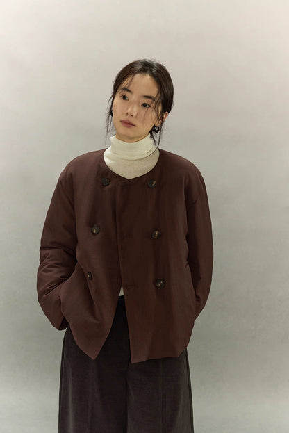 Dark coffee brown double-breasted puffer jacket worn open without scarf collar