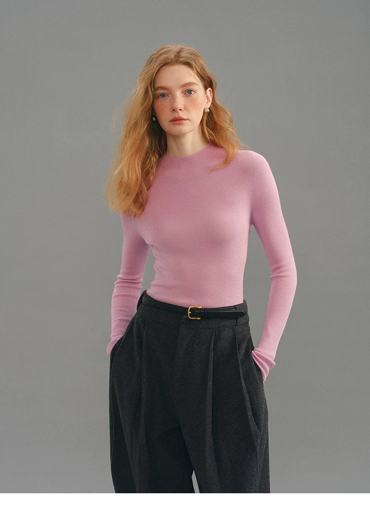 Dusty pink seamless wool sweater, front view