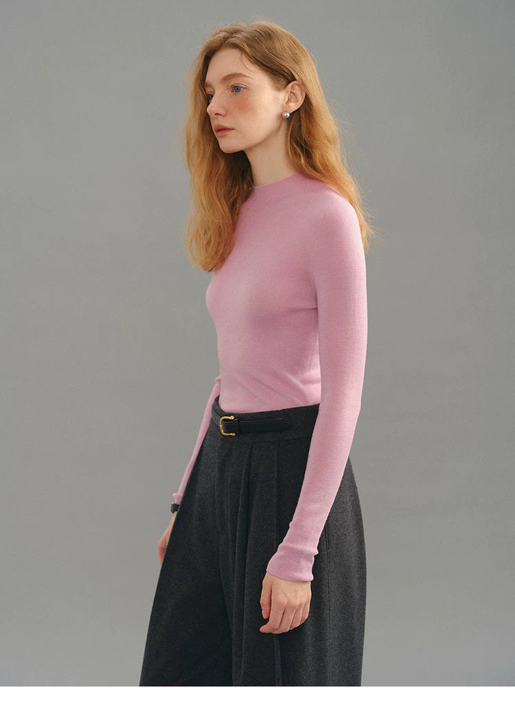 Dusty pink seamless wool sweater, side view