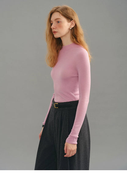 Dusty pink seamless wool sweater, side view