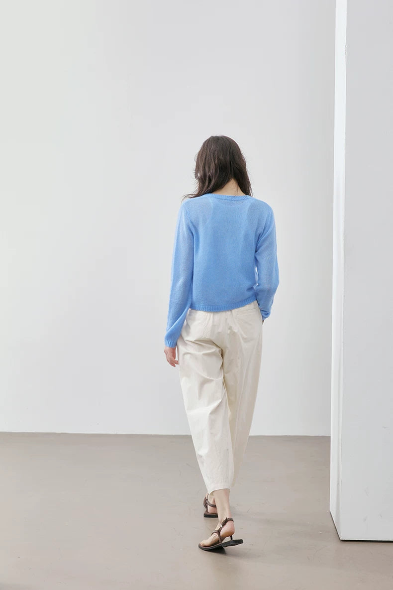 Sky Blue cashmere silk cardigan, back view walking
