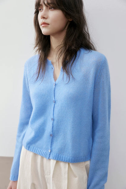 Sky Blue cashmere silk cardigan, close front view with button detail