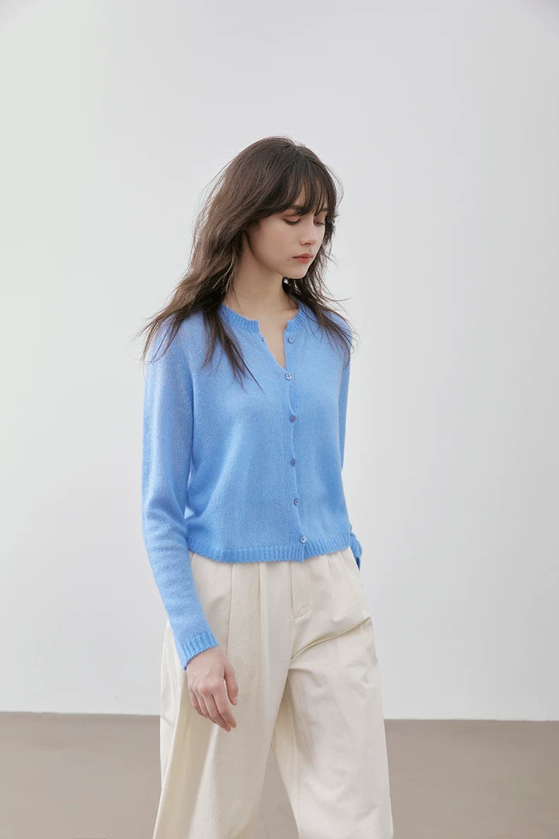 Sky Blue cashmere silk cardigan, side view walking