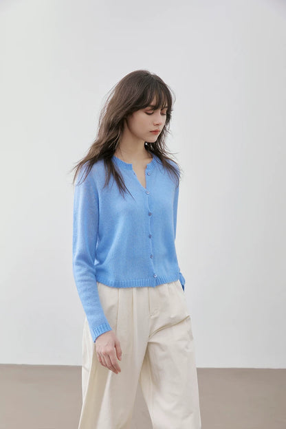 Sky Blue cashmere silk cardigan, side view walking