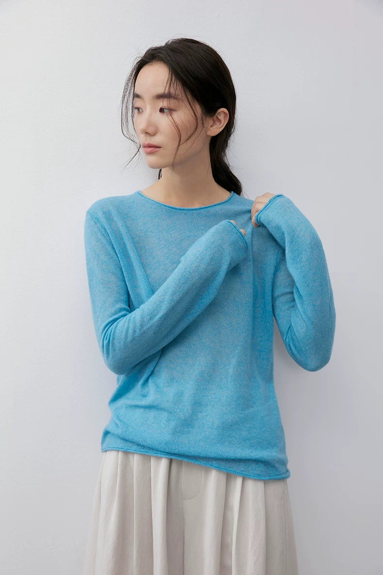 Sky Blue pullover, close-up of rolled cuff and sleeve detail