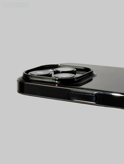 Clear black phone case close up showing raised camera protection edge and side button design