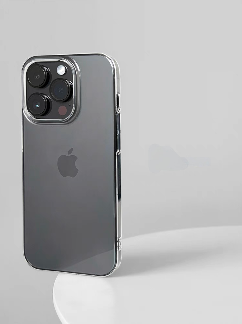 Fully transparent phone case on iPhone standing upright showing crystal clear back design