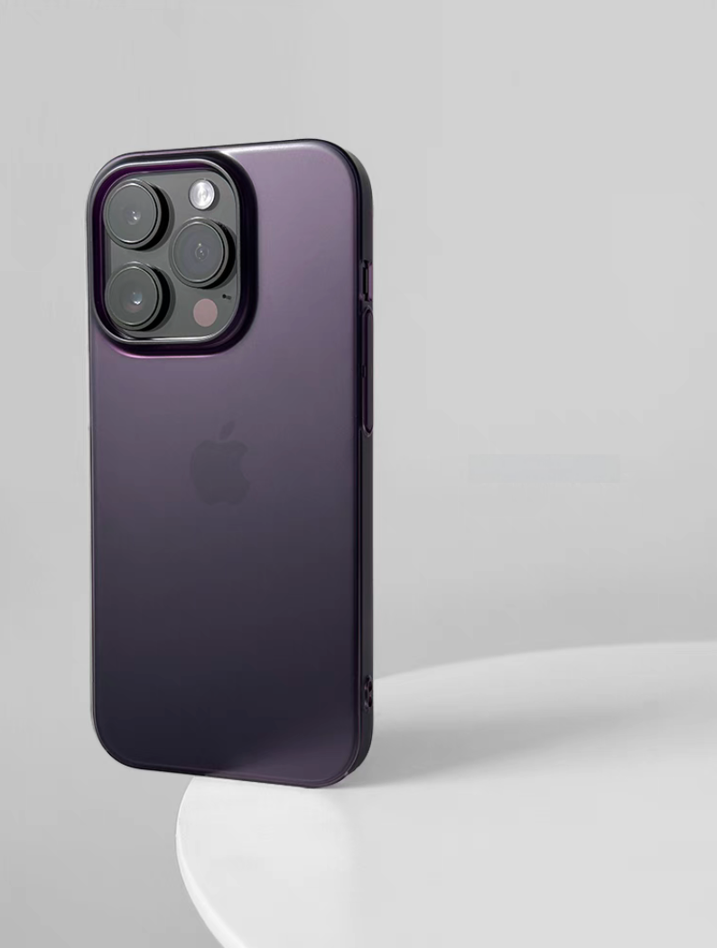 Matte purple phone case on iPhone standing upright with soft gradient purple finish