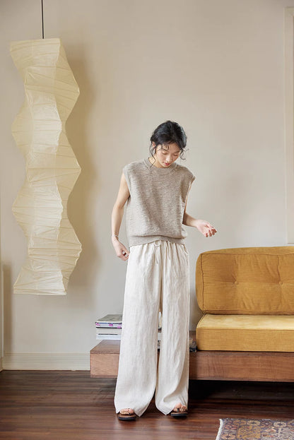 Full-body look of Cream Gray sleeveless vest styled with light wide-leg pants, highlighting relaxed silhouette and breathable summer outfit