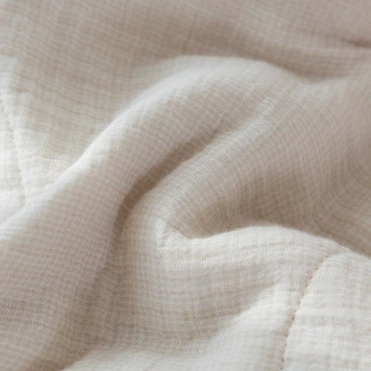 Close-up texture of Light Yellow SoftNest cotton muslin fabric showing soft breathable woven structure