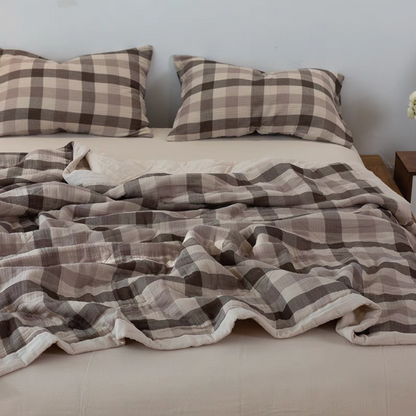 SoftNest triple-layer cotton muslin bedding set in Beige Coffee Stripes draped across bed with matching pillow shams