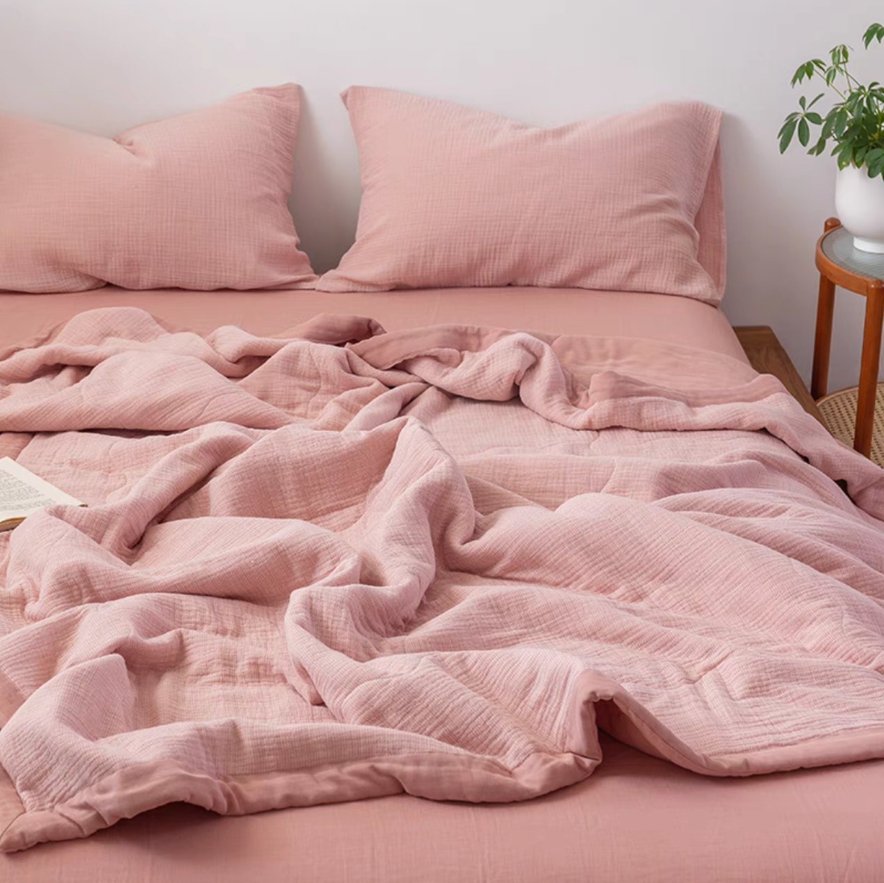 Smoky Pink SoftNest triple-layer cotton muslin bedding set styled on bed with matching pillowcases creating cozy bedroom decor