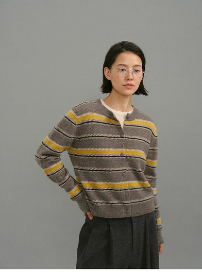 Front portrait view of the taupe-yellow striped crewneck cardigan, showing the button-up design and soft knit texture.