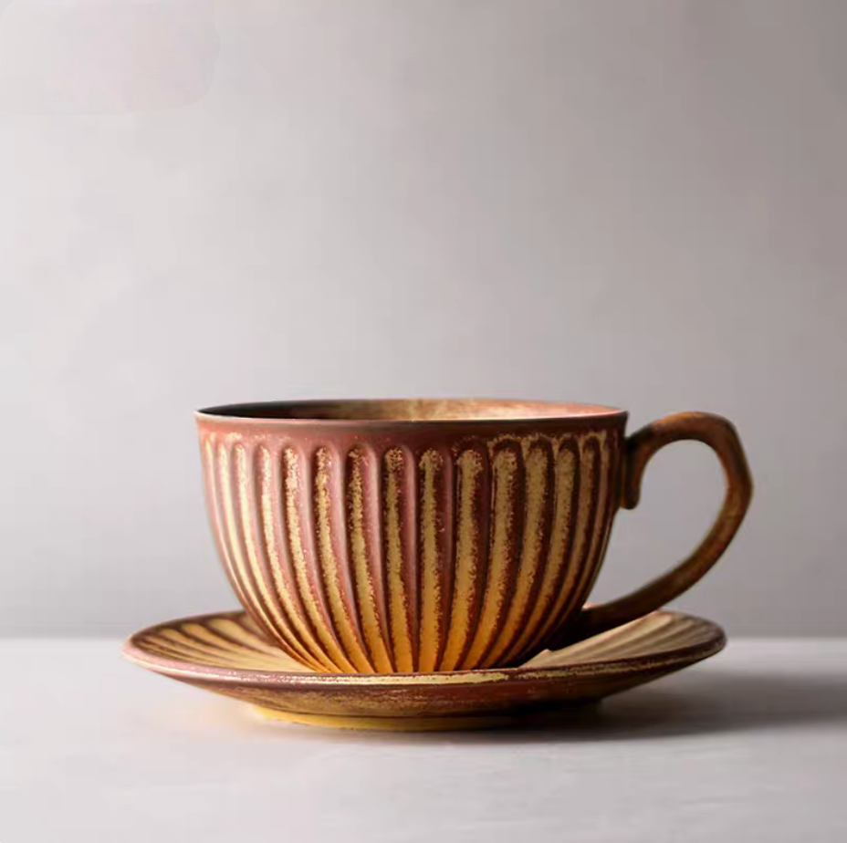 Yellow striped ceramic cappuccino art cup and saucer in clean product view with warm earthy glaze and ribbed texture