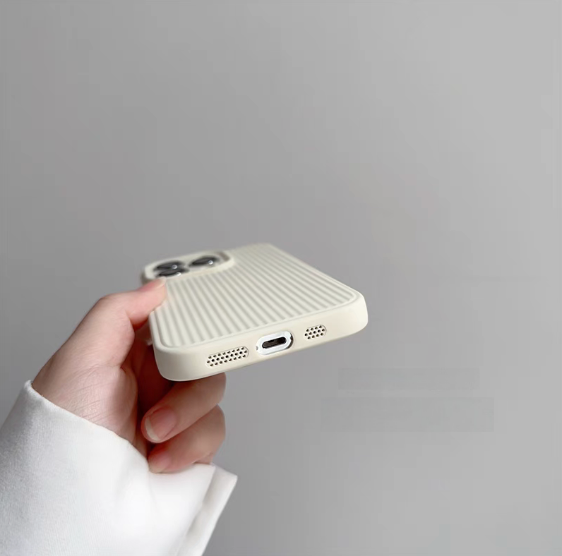 White striped phone case angled view highlighting slim profile and grip texture