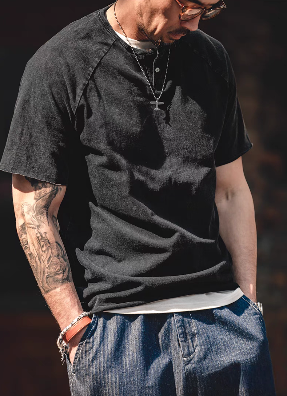 Style Washed Henley T-Shirt Black angled worn view showing soft cotton texture quarter placket design and casual styling