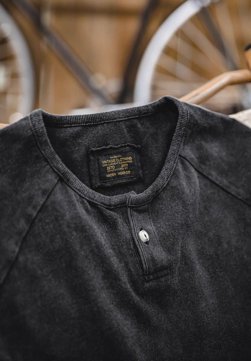 Style Washed Henley T-Shirt Black close-up of collar and quarter placket button detail showing vintage washed cotton texture