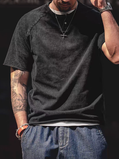 Style Washed Henley T-Shirt Black front worn view showing relaxed fit short sleeves and vintage washed finish