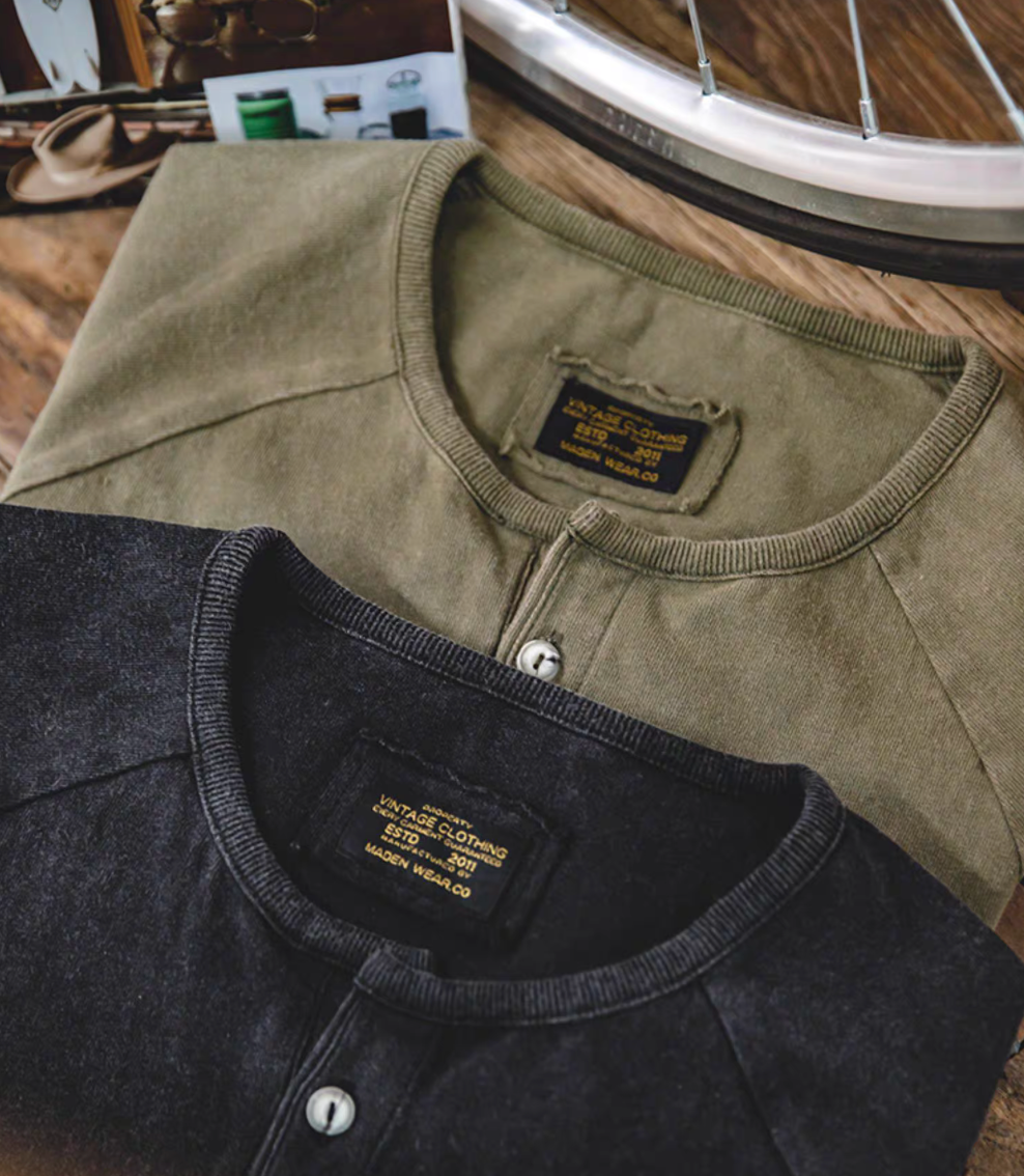 Style Washed Henley T-Shirt Green and Black flat lay showing vintage washed cotton texture Y-shaped quarter placket button detail and ribbed crewneck collar