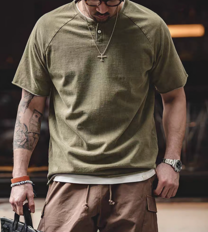 Style Washed Henley T-Shirt Green front worn view showing vintage washed cotton fabric quarter placket button detail and relaxed fit