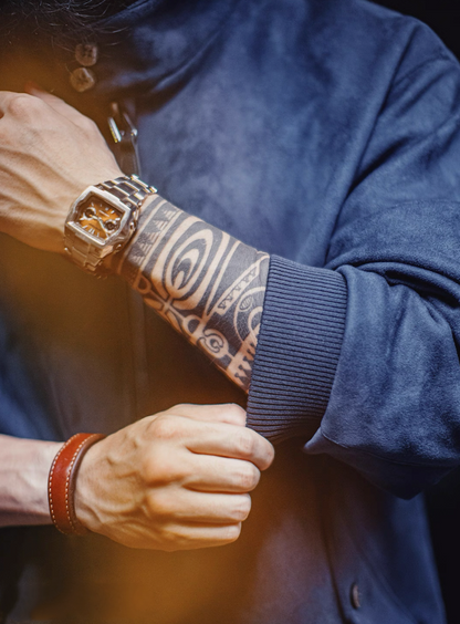 Detail of ribbed cuff and sleeve on navy blue suede Harrington jacket