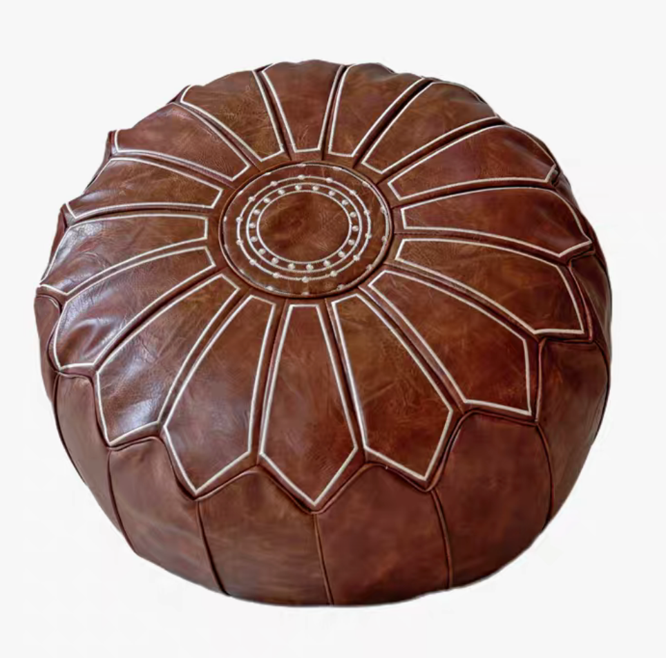 Camel sunburst embroidered faux leather pouf ottoman top view showing stitched medallion pattern