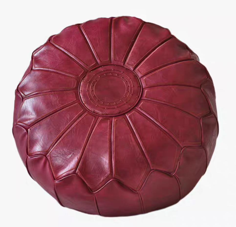 Dragon fruit red sunburst embroidered faux leather pouf ottoman top view with stitched medallion