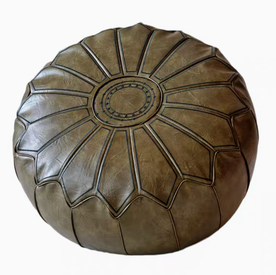 Olive green sunburst embroidered faux leather pouf ottoman top view with stitched medallion