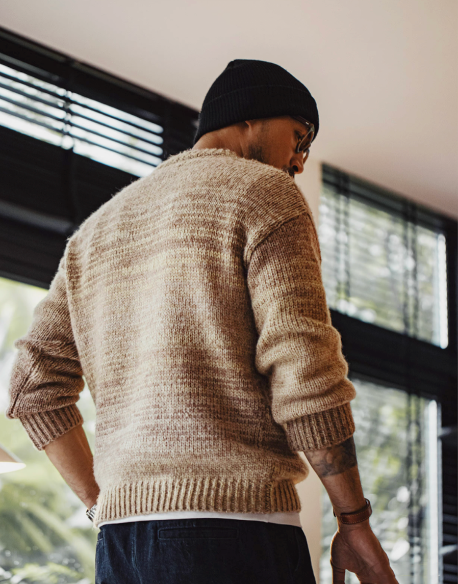 Back view of Sunset Drift Knit Sweater in Tea Brown showcasing gradient ombré knit design relaxed silhouette and ribbed hem finish