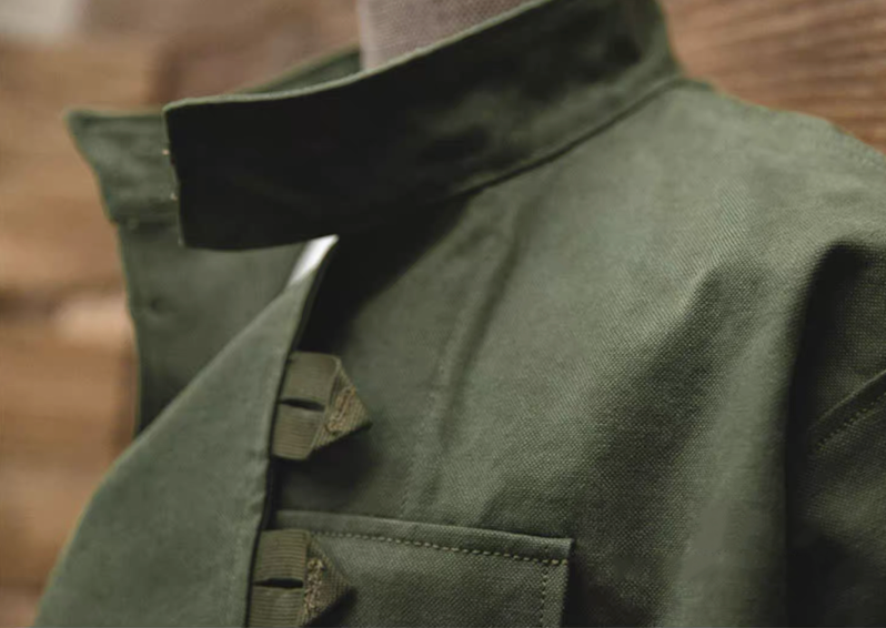 Interior label and stitching detail of Swedish military motorcycle jacket – heritage workwear style.