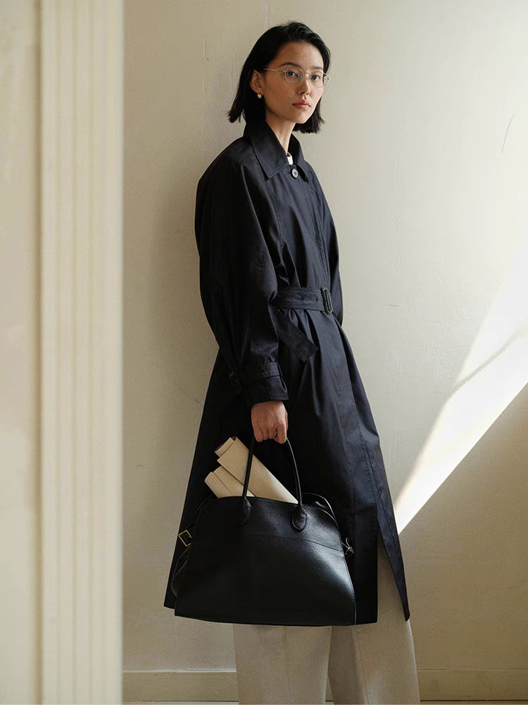 Side view of Dark Navy Blue Tailored Belted Trench Coat highlighting cinched waist belt, relaxed fit and structured drape
