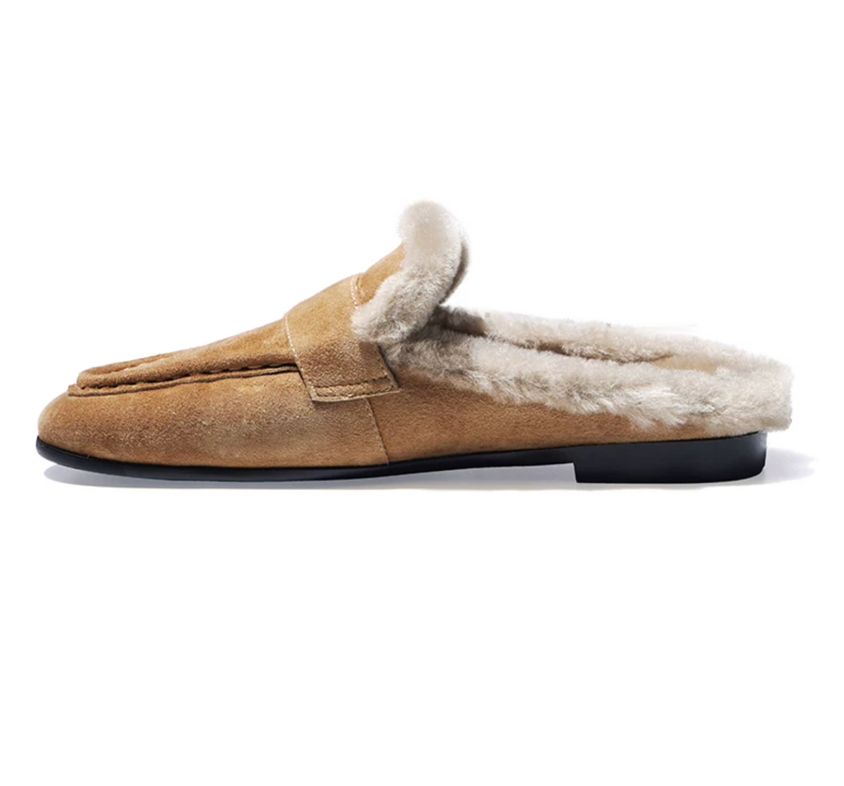 Side profile of a tan suede loafer mule with moc-toe stitching and a 0.6-inch heel