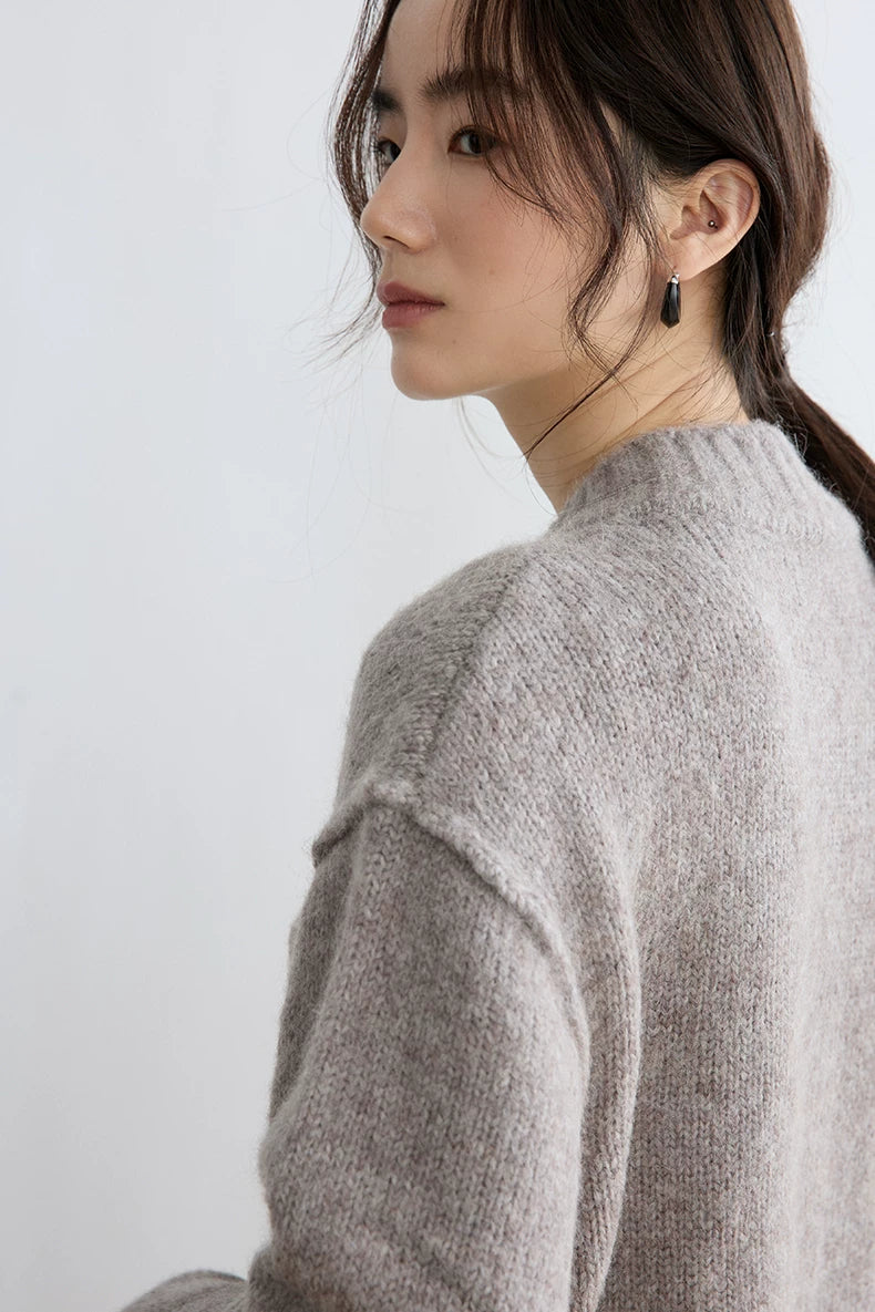 Taupe alpaca wool cardigan, close-up of dropped shoulder and ribbed neckline