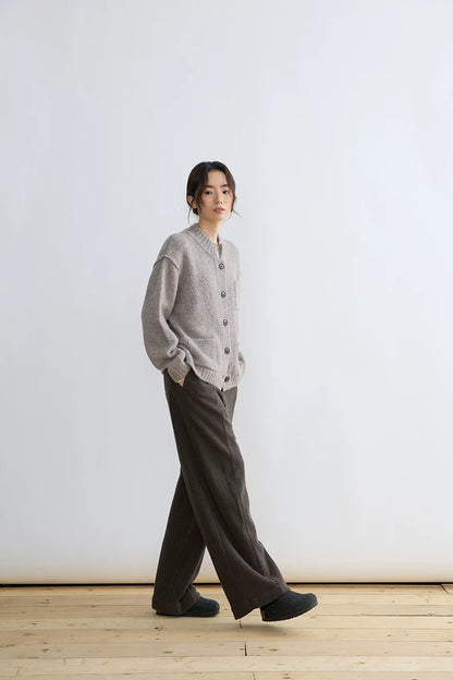 Taupe alpaca wool cardigan, side view walking