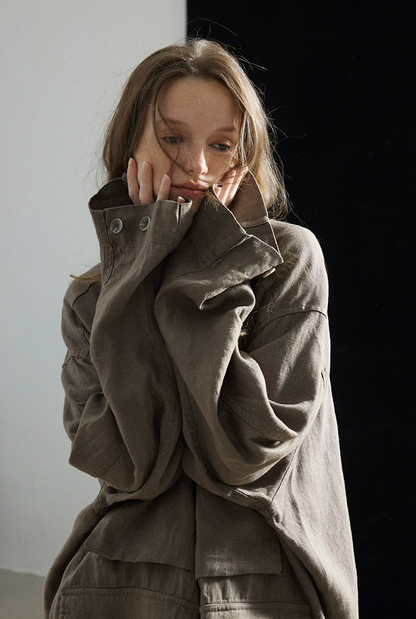 Close-up of a taupe linen shacket&