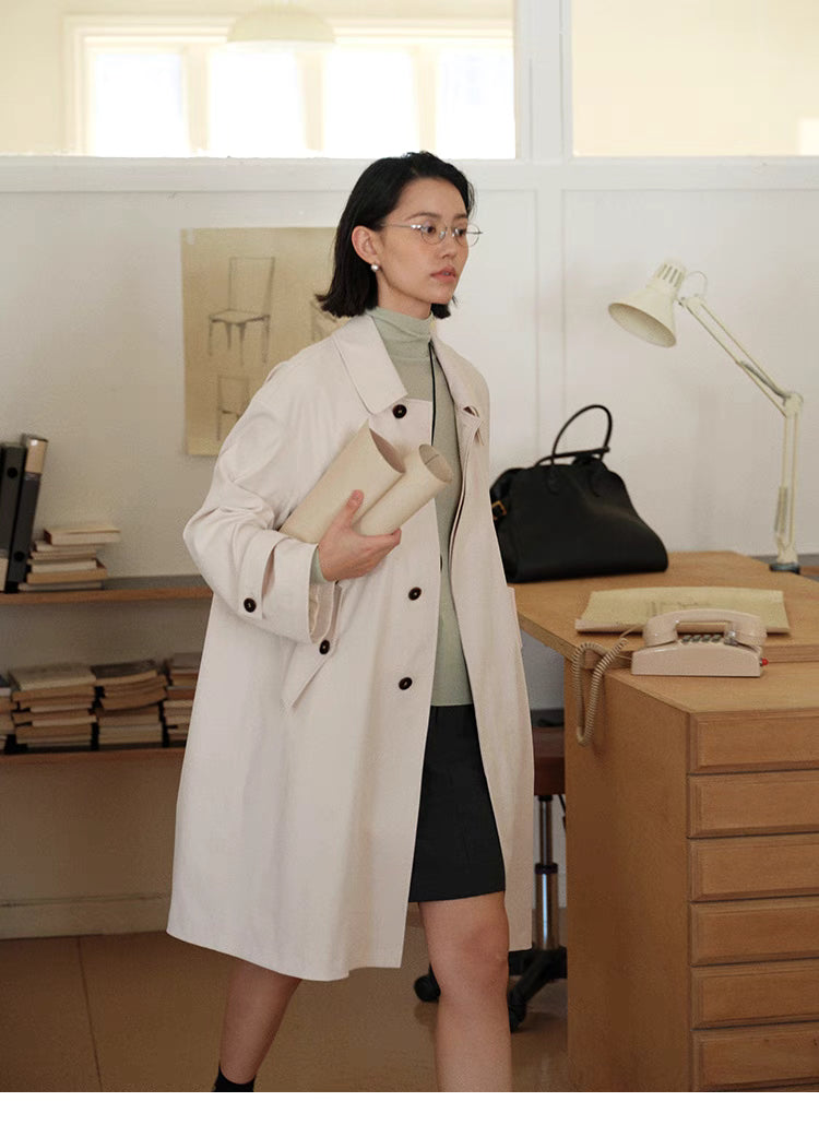 Timeless Trench Coat in Tea Beige full body walking view showing elegant silhouette, lightweight fabric and transitional styling