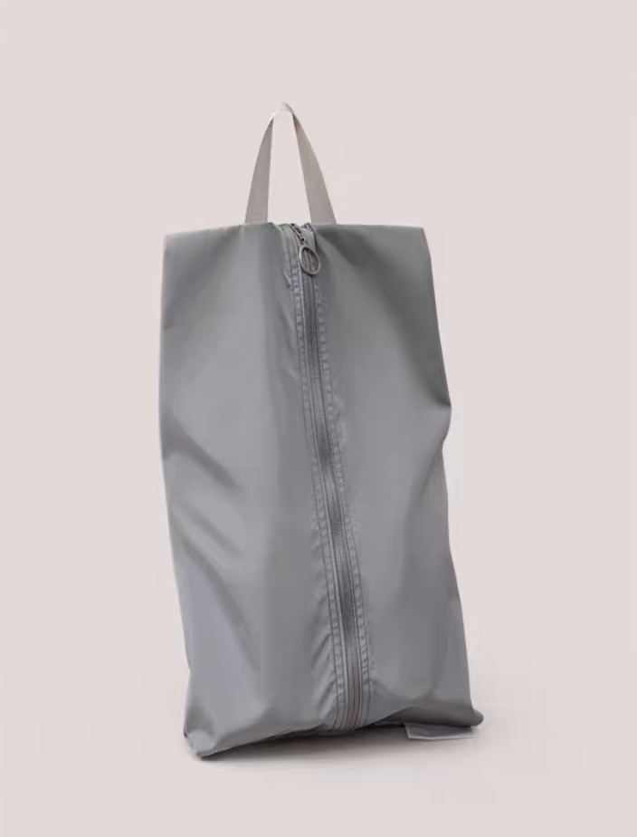 Travel Shoe Dust Bag in ultimate gray color upright view showcasing structured design and secure zipper closure