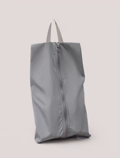 Travel Shoe Dust Bag in ultimate gray color upright view showcasing structured design and secure zipper closure