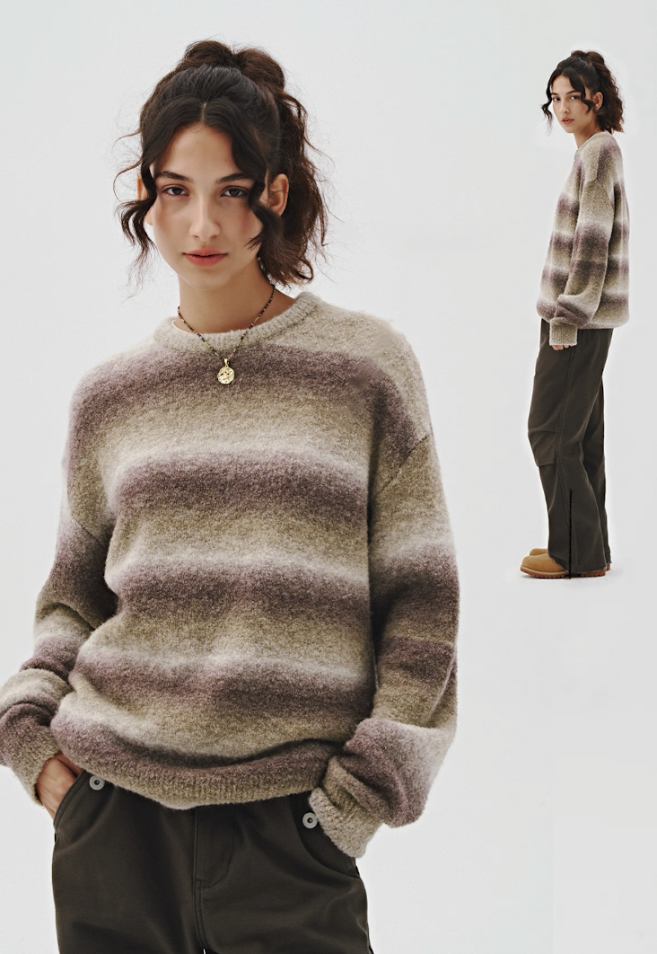 Front and side view of unisex ombre gradient sweater in sage-grey, soft brushed knit, styled with loose pants.