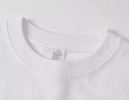 Urban Forest Tee white crewneck collar close-up showing stitching and label detail