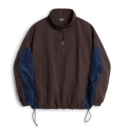 Front flat-lay of URBANCORE dark coffee brown half-zip nylon pullover jacket with navy corduroy side panels and adjustable drawcord hem.