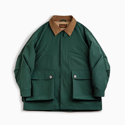 Utility Field Jacket in Dark Green front view showing corduroy collar, double closure and oversized flap pockets