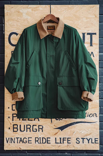 Dark Green Utility Field Jacket hanging on rack highlighting structured shape, corduroy collar and large front pockets