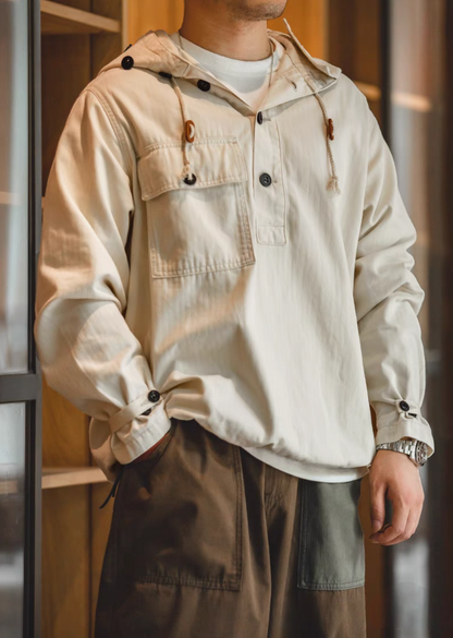 Off-White Utility Pocket Hooded Pullover Jacket styled indoors highlighting front pocket, half-button design, and casual fit
