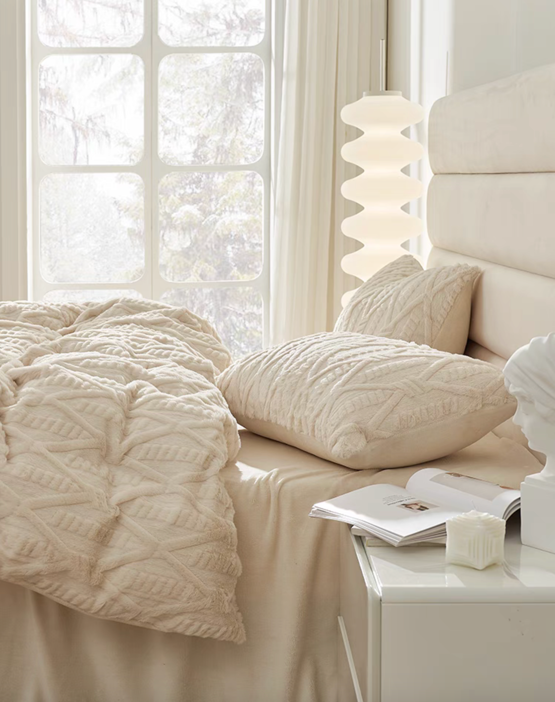 VelourRest ivory white rex rabbit fur duvet bedding set with textured pillows and cozy bedroom styling beside bedside table