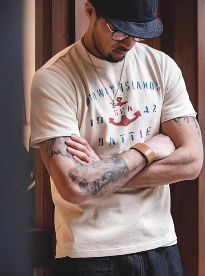 Vintage Anchor Battle Tee White worn lifestyle view with arms crossed showing soft cotton fabric and vintage graphic