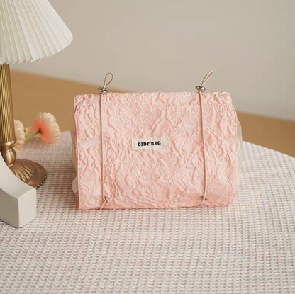 Vintage Chic Waterproof Travel Makeup Bag in pink color upright display with soft tone finish creating elegant and feminine look