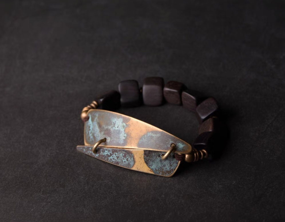 Vintage ebony wood and brass bracelet with coffee brown wooden beads and copper patina brass plate, handcrafted front view