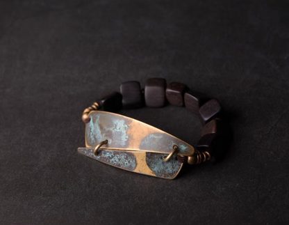 Vintage ebony wood and brass bracelet with coffee brown wooden beads and copper patina brass plate, handcrafted front view